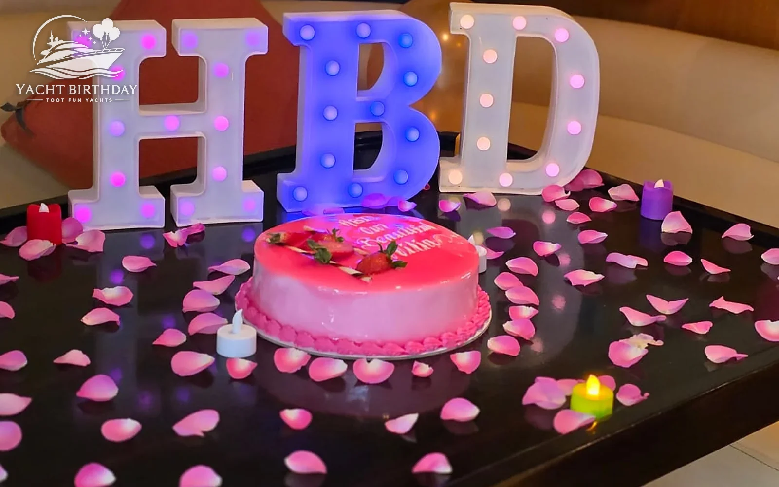 Birthday cake rose petals yacht table