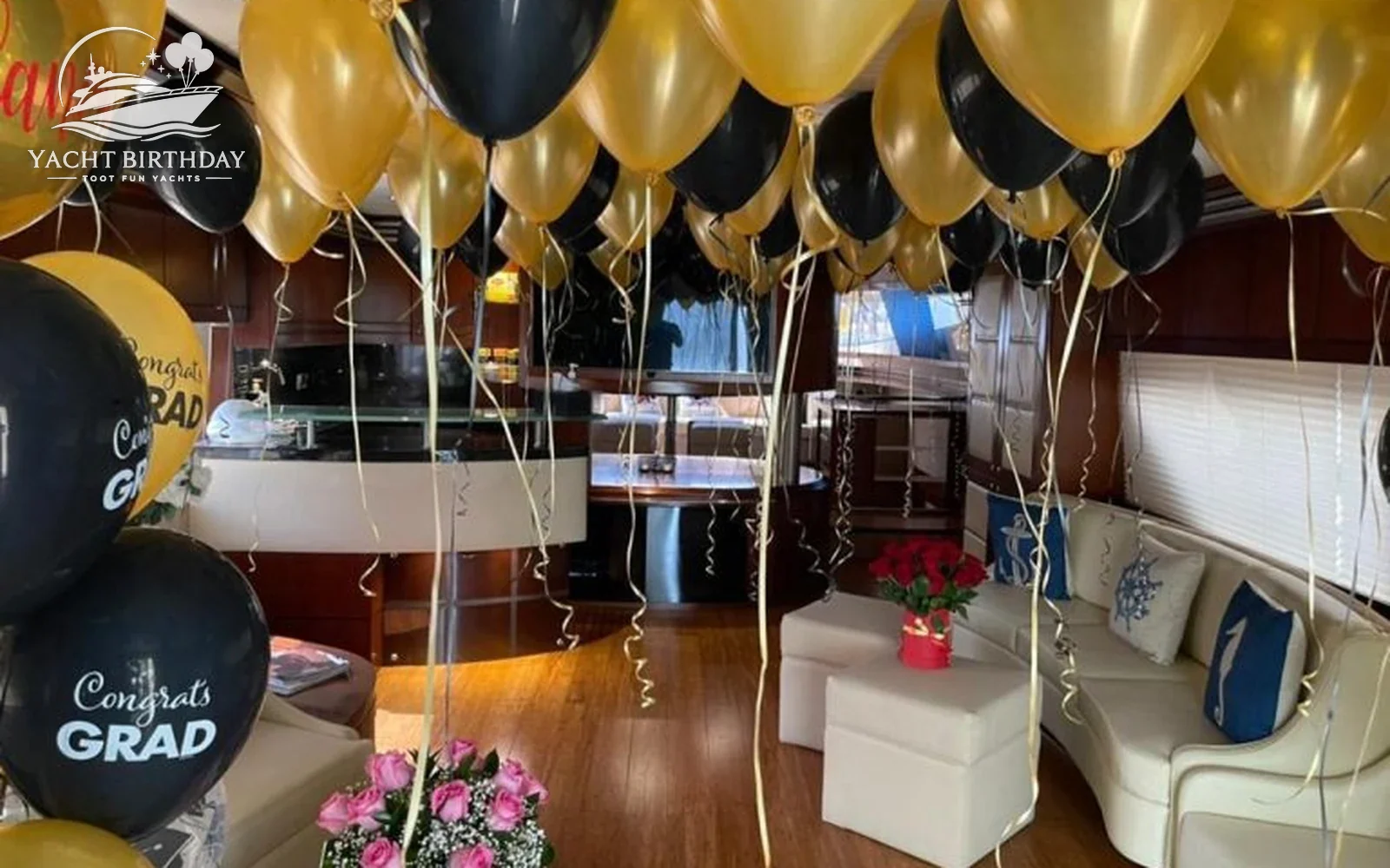 Graduation balloons gold black yacht dubai