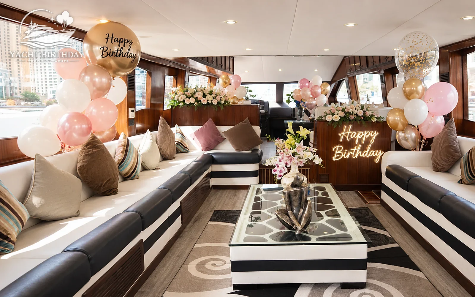 Pink gold birthday balloons yacht lounge