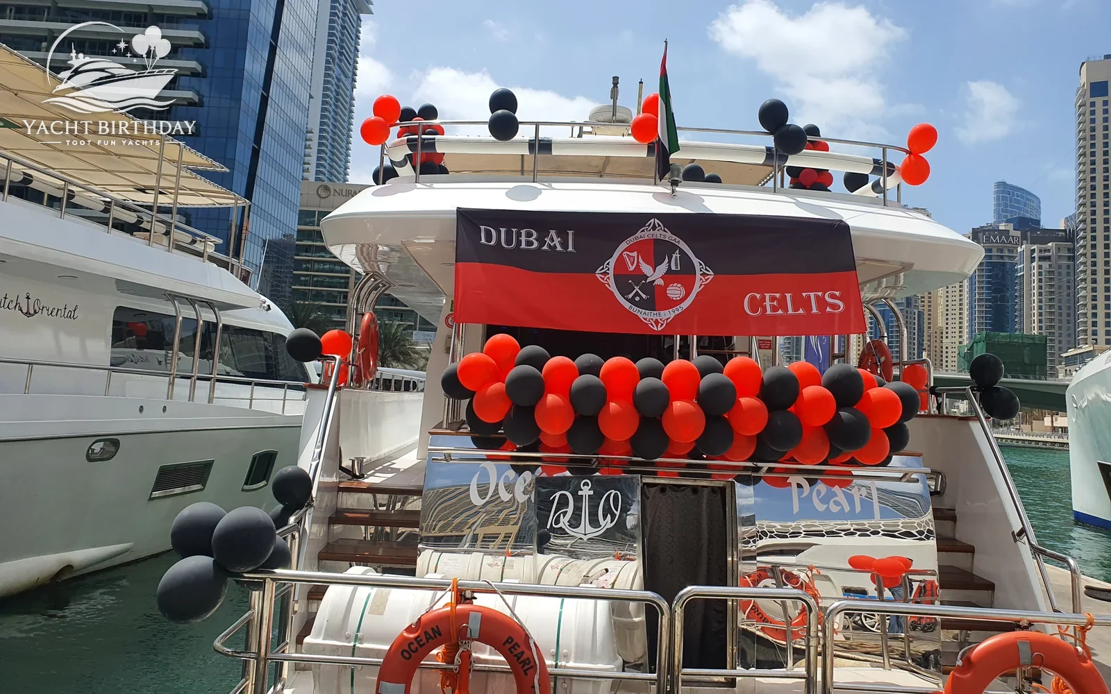 Red black balloons yacht dubai marina
